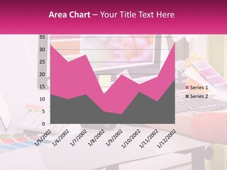 A Woman Sitting At A Desk Using A Computer PowerPoint Template