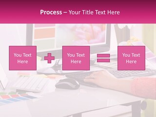 A Woman Sitting At A Desk Using A Computer PowerPoint Template