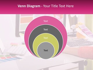 A Woman Sitting At A Desk Using A Computer PowerPoint Template
