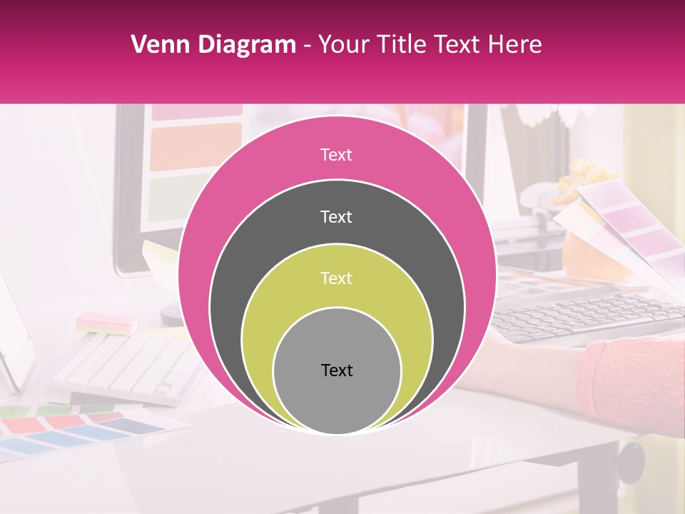 A Woman Sitting At A Desk Using A Computer PowerPoint Template