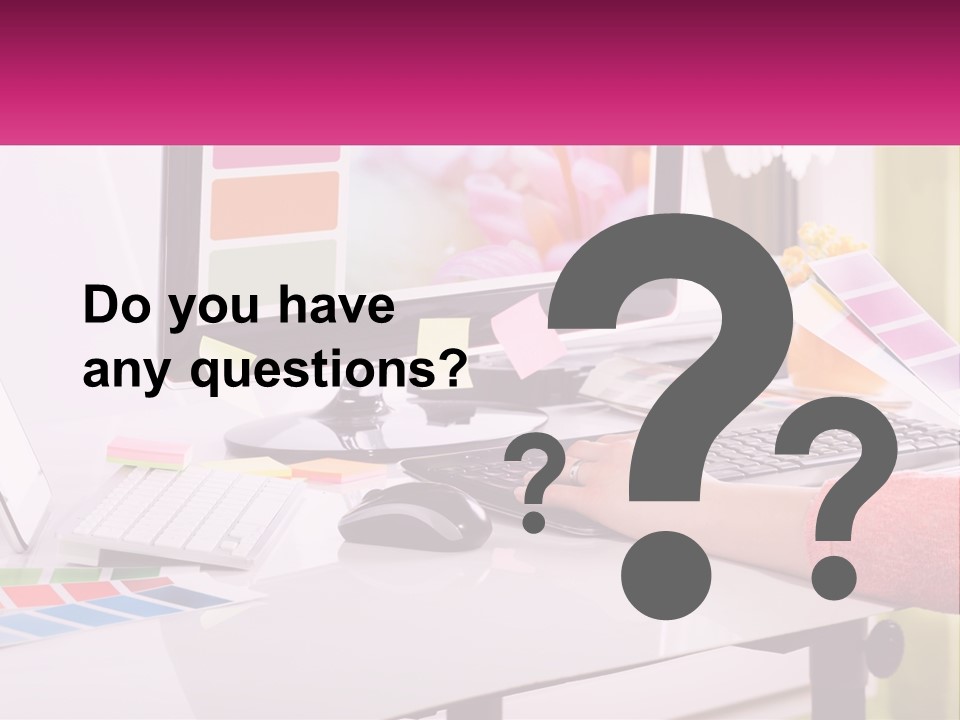 A Woman Sitting At A Desk Using A Computer PowerPoint Template