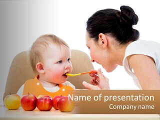 A Woman Feeding A Baby With A Spoon PowerPoint Template