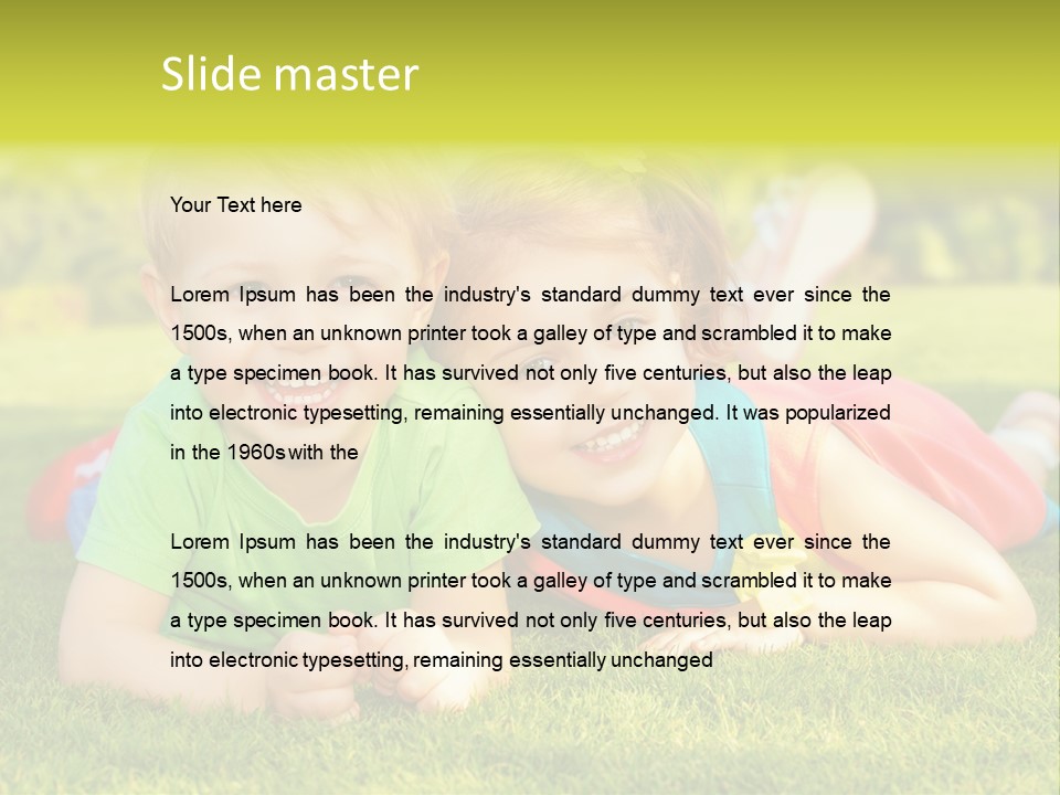 Two Young Children Laying On The Grass In A Park PowerPoint Template