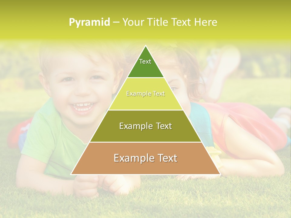 Two Young Children Laying On The Grass In A Park PowerPoint Template