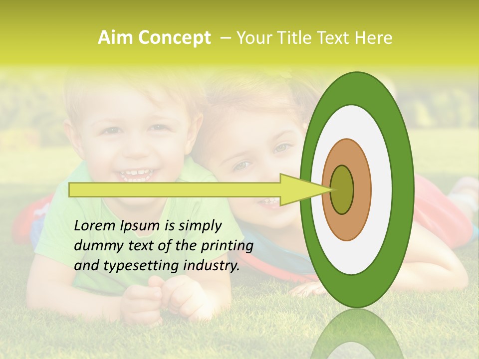 Two Young Children Laying On The Grass In A Park PowerPoint Template