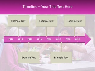 A Group Of People Toasting Wine Glasses At A Table PowerPoint Template