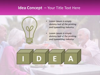 A Group Of People Toasting Wine Glasses At A Table PowerPoint Template