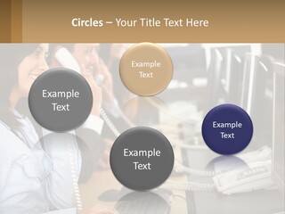 A Group Of People Sitting At A Desk Talking On Telephones PowerPoint Template