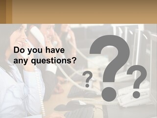 A Group Of People Sitting At A Desk Talking On Telephones PowerPoint Template