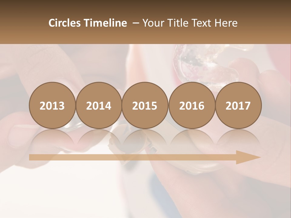 A Person Holding A Cell Phone In Their Hand PowerPoint Template