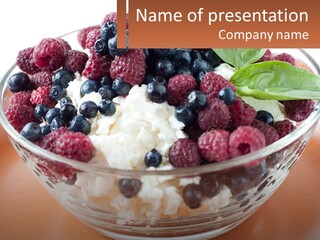 A Bowl Filled With Berries And Cottage Cheese PowerPoint Template