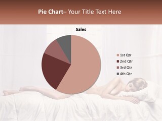 A Woman Laying On Top Of A Bed In A Bikini PowerPoint Template