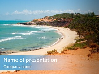 A Sandy Beach With A Body Of Water In The Background PowerPoint Template