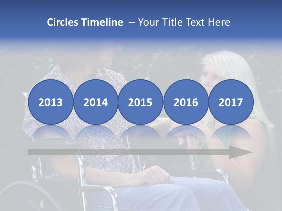 A Woman Sitting In A Wheel Chair Talking To Another Woman PowerPoint Template