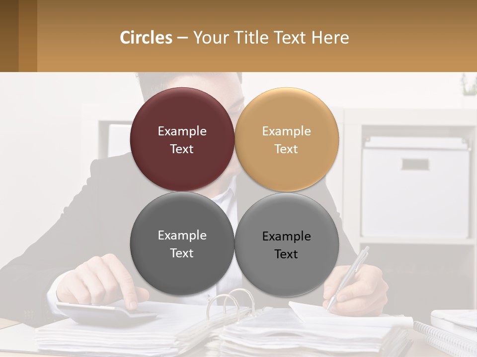 A Man Sitting At A Desk Writing On A Piece Of Paper PowerPoint Template