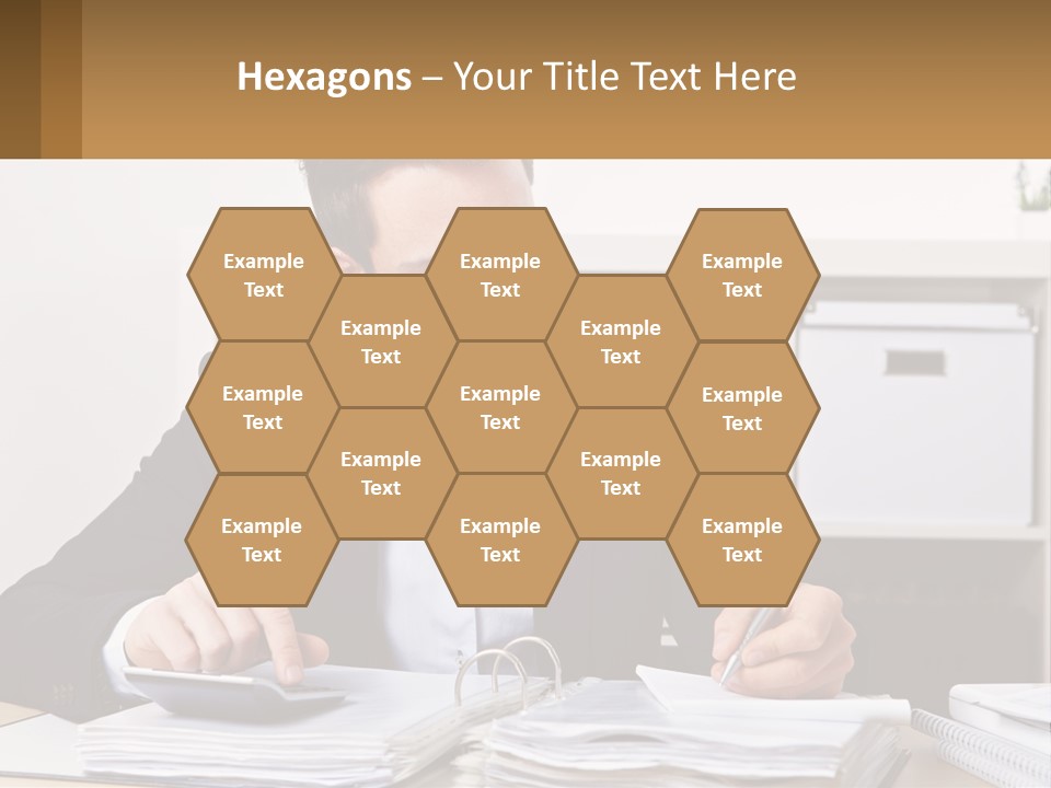 A Man Sitting At A Desk Writing On A Piece Of Paper PowerPoint Template