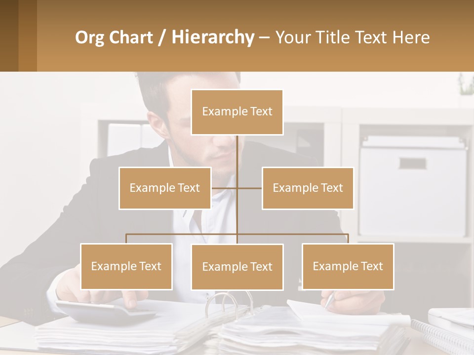 A Man Sitting At A Desk Writing On A Piece Of Paper PowerPoint Template