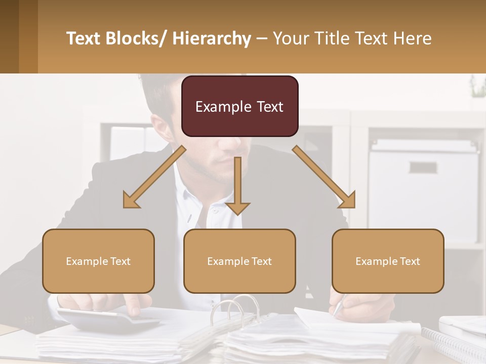 A Man Sitting At A Desk Writing On A Piece Of Paper PowerPoint Template