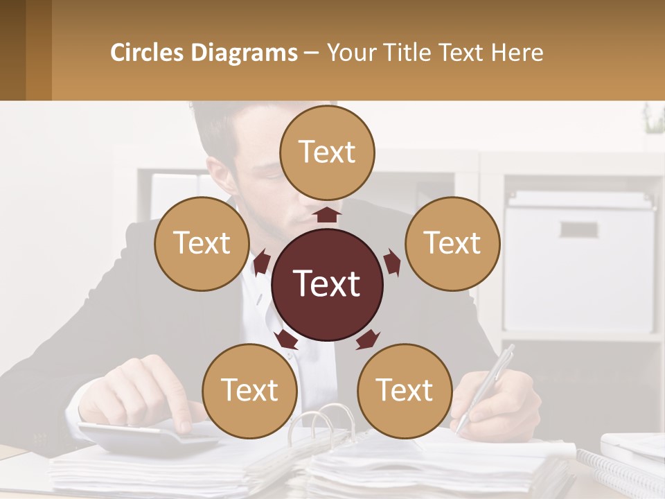 A Man Sitting At A Desk Writing On A Piece Of Paper PowerPoint Template