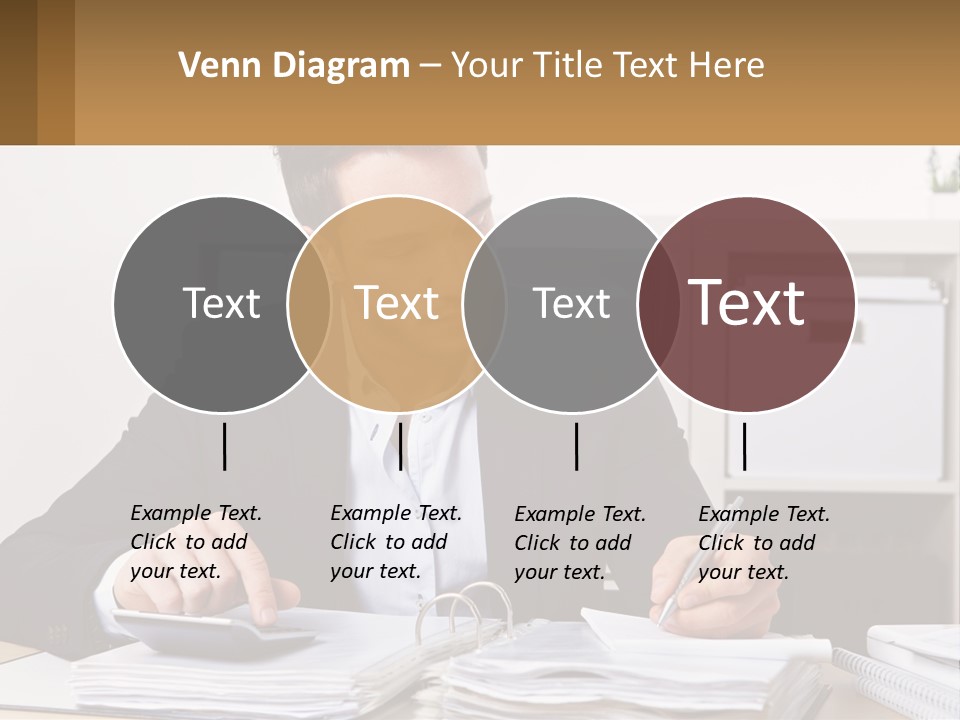 A Man Sitting At A Desk Writing On A Piece Of Paper PowerPoint Template