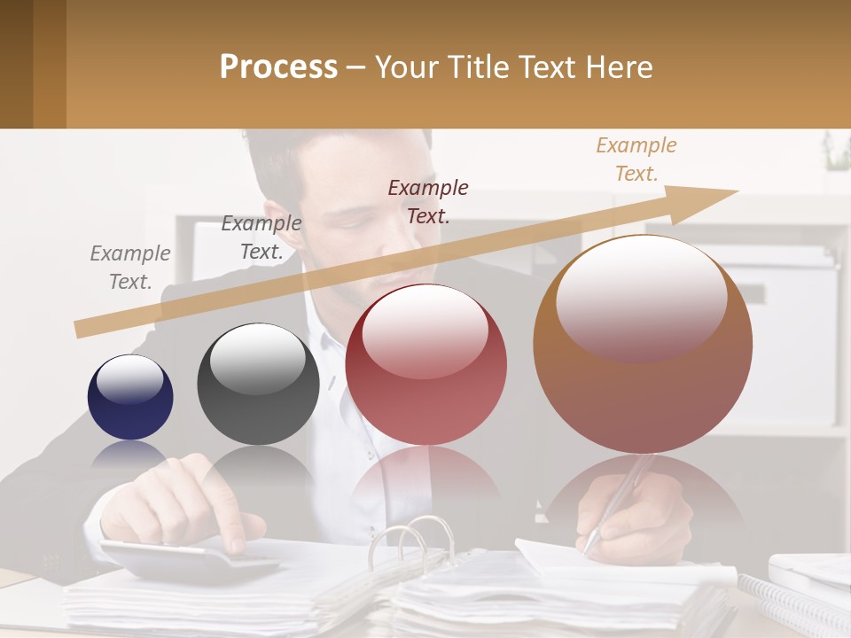 A Man Sitting At A Desk Writing On A Piece Of Paper PowerPoint Template