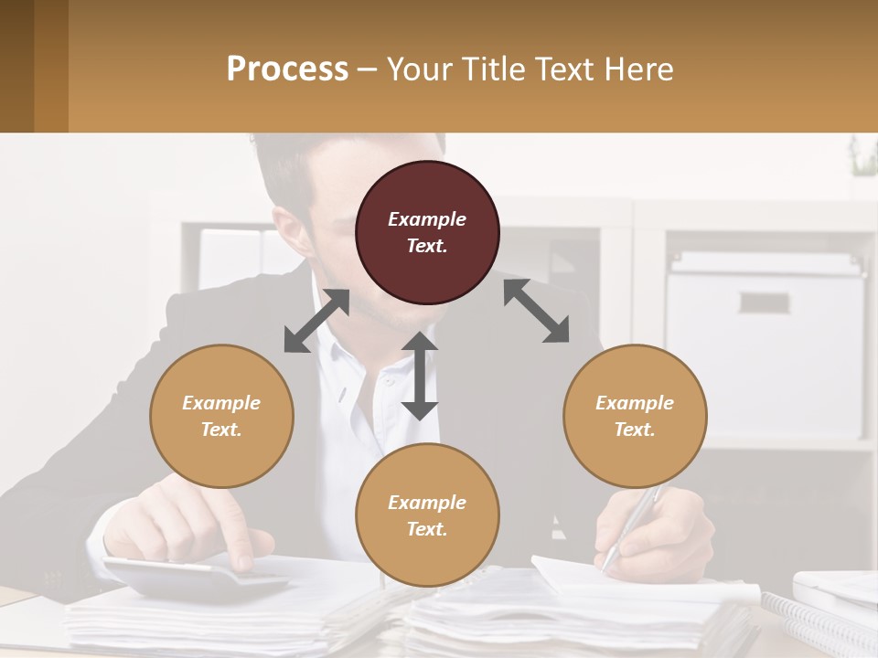 A Man Sitting At A Desk Writing On A Piece Of Paper PowerPoint Template