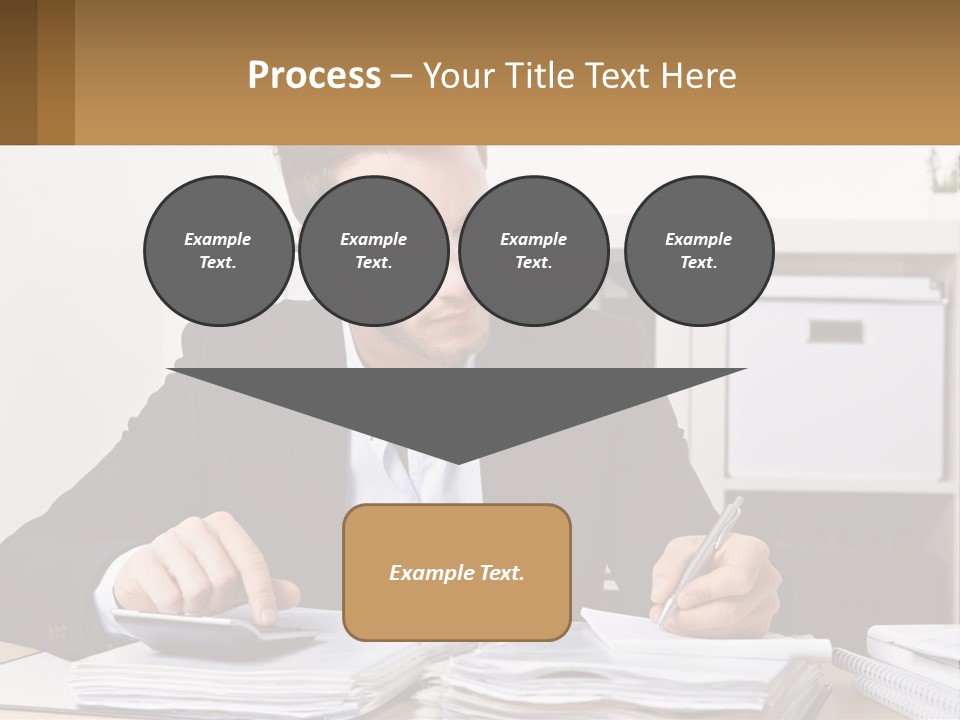 A Man Sitting At A Desk Writing On A Piece Of Paper PowerPoint Template