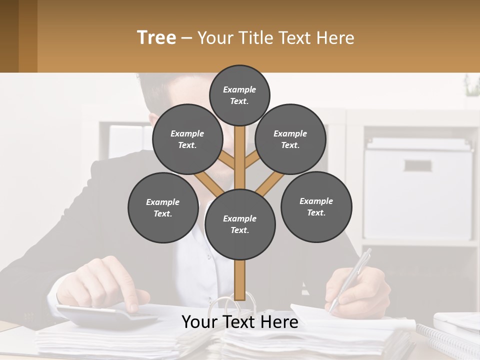 A Man Sitting At A Desk Writing On A Piece Of Paper PowerPoint Template