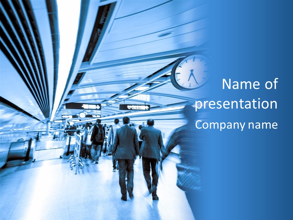 A Group Of People Walking Through A Train Station PowerPoint Template