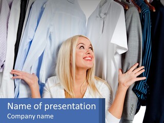 A Woman Standing In Front Of A Rack Of Shirts PowerPoint Template