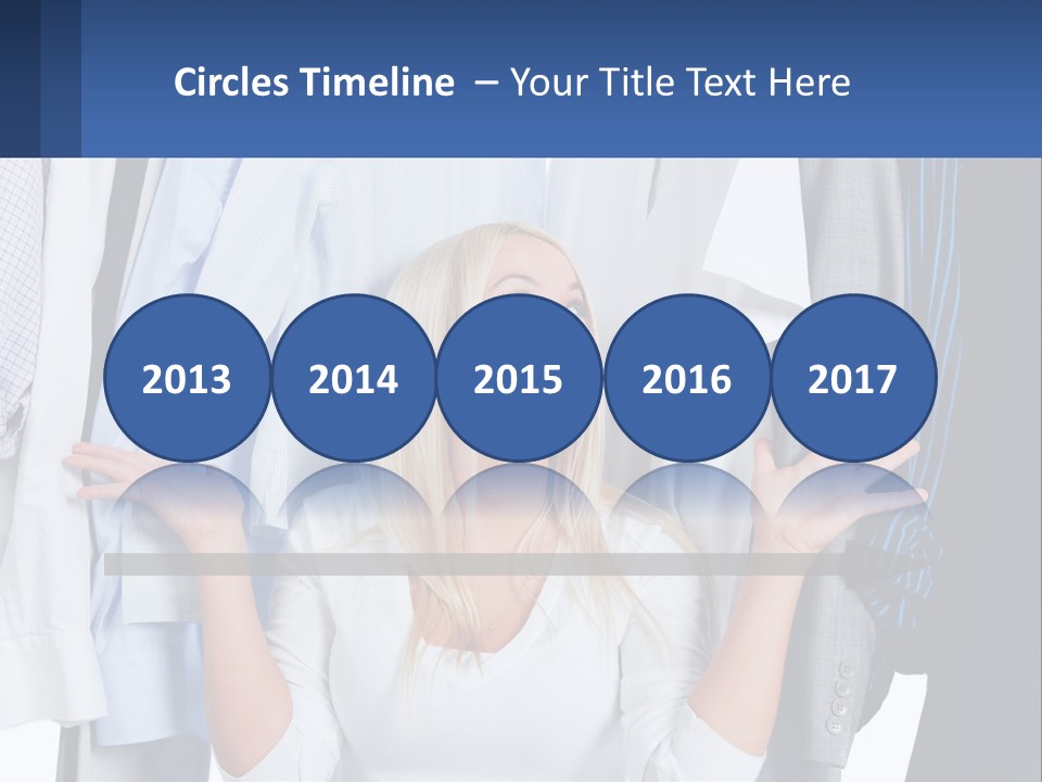 A Woman Standing In Front Of A Rack Of Shirts PowerPoint Template