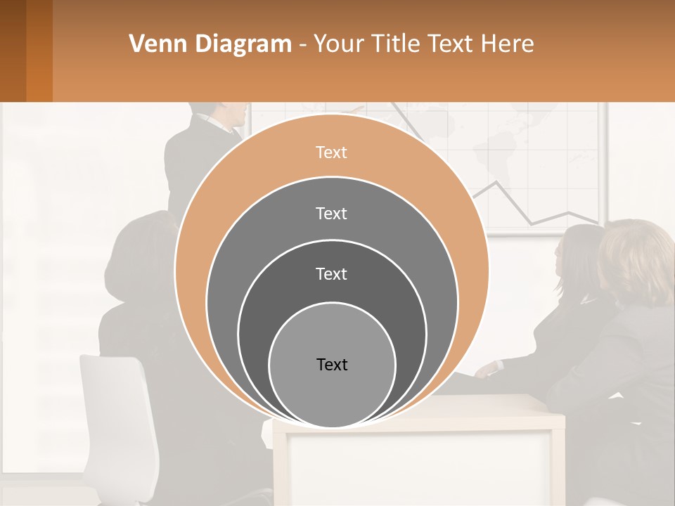 A Group Of People Sitting Around A Table In Front Of A Whiteboard PowerPoint Template