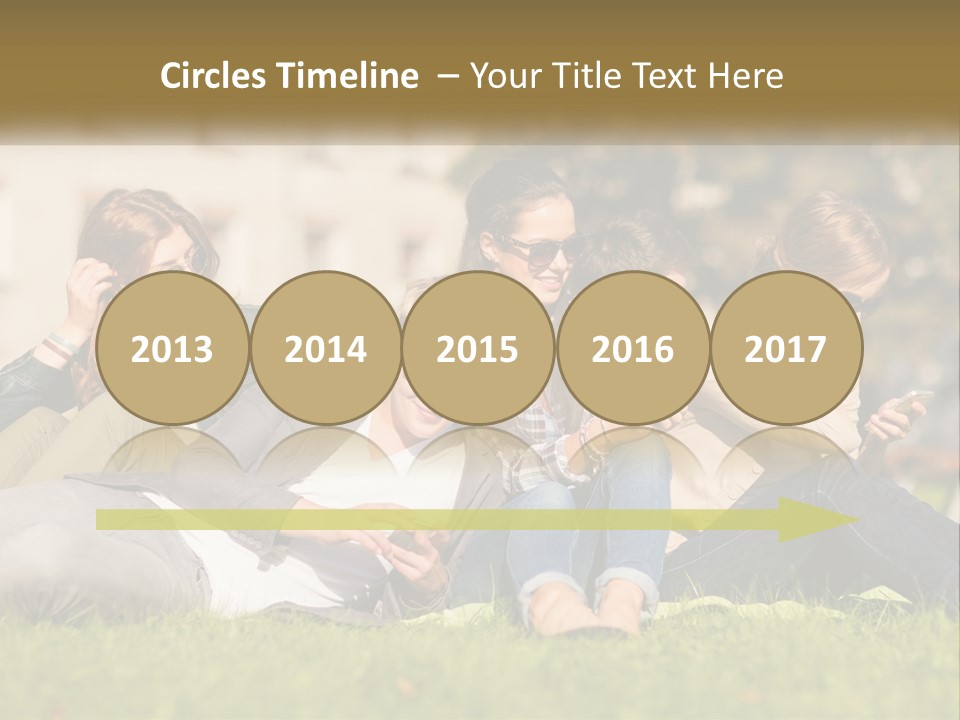 A Group Of People Sitting On The Grass Looking At Their Cell Phones PowerPoint Template