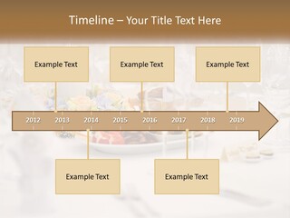 A White Table Topped With A Plate Of Food And Wine Glasses PowerPoint Template
