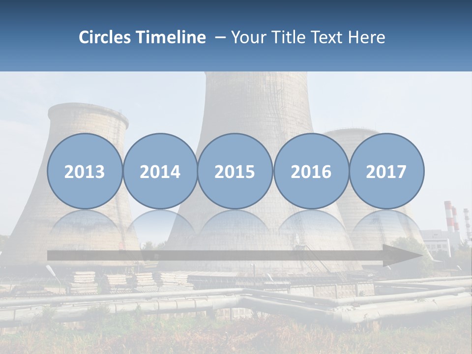 A Power Plant With Three Towers In The Background PowerPoint Template