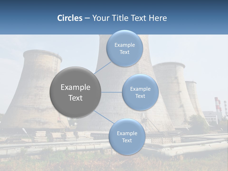 A Power Plant With Three Towers In The Background PowerPoint Template