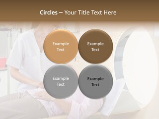 A Woman In A Hospital Bed Being Examined By A Doctor PowerPoint Template