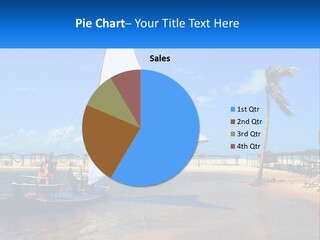 A Sailboat On The Water With A Beach In The Background PowerPoint Template