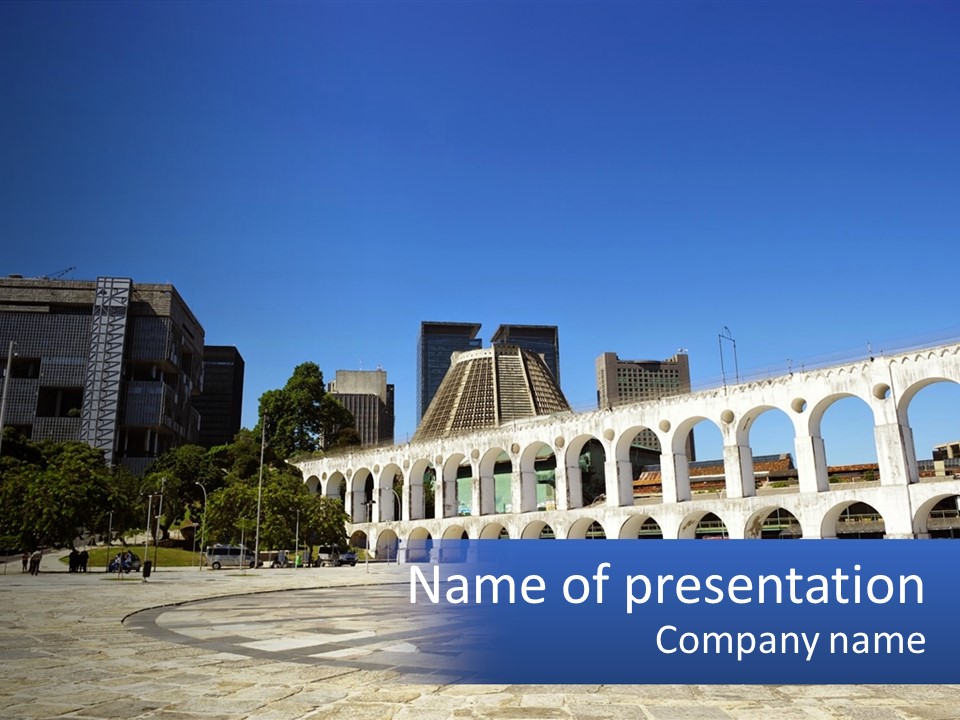 A Large White Building With Arches In Front Of It PowerPoint Template