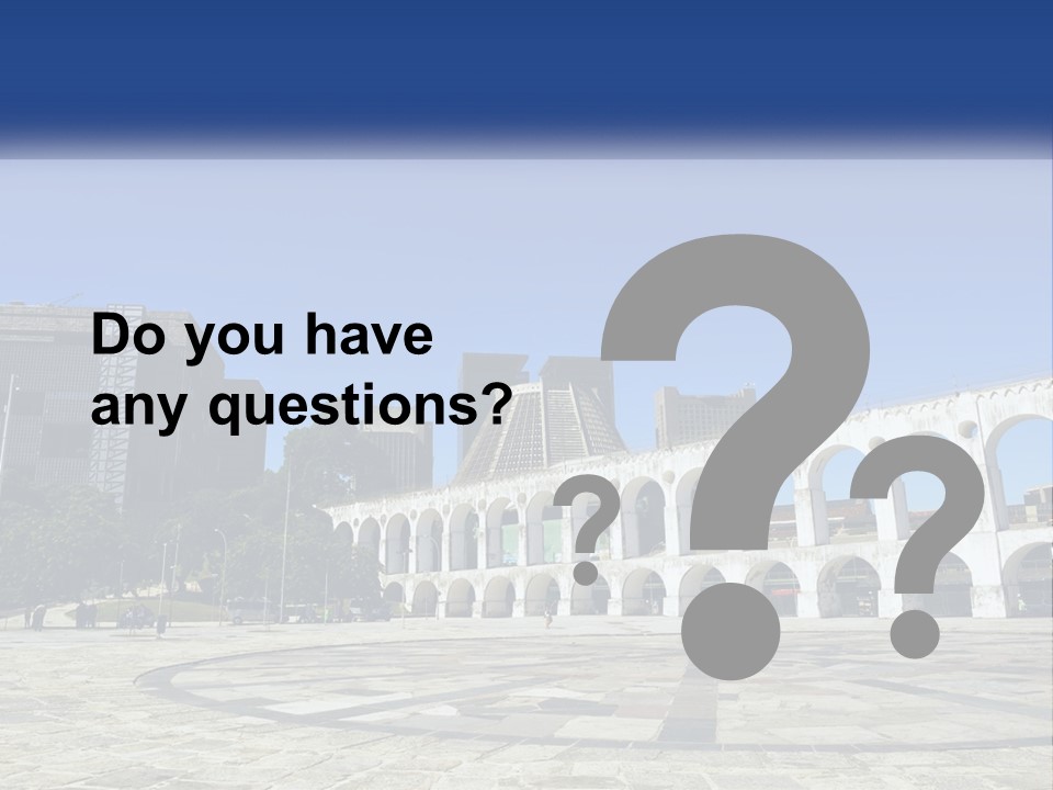 A Large White Building With Arches In Front Of It PowerPoint Template