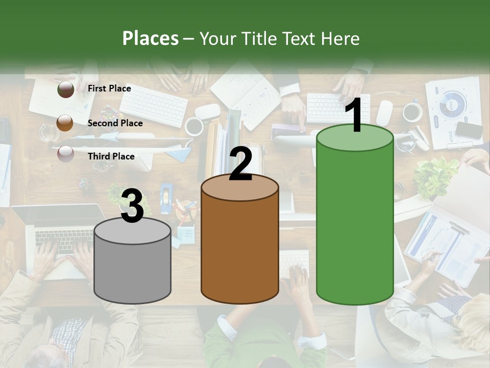 A Group Of People Sitting At A Table Working On Laptops PowerPoint Template