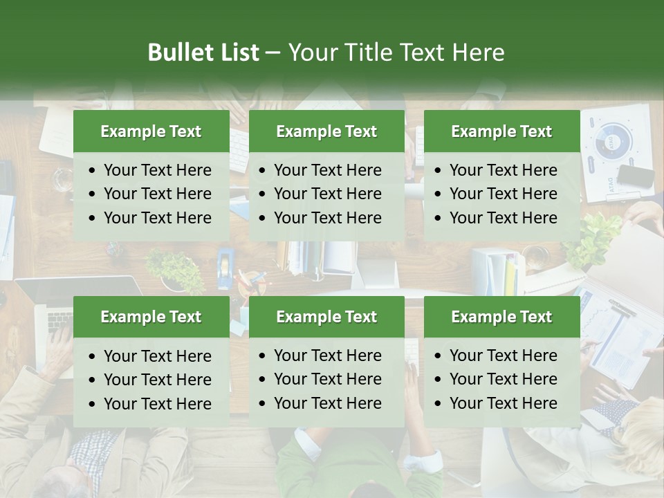 A Group Of People Sitting At A Table Working On Laptops PowerPoint Template