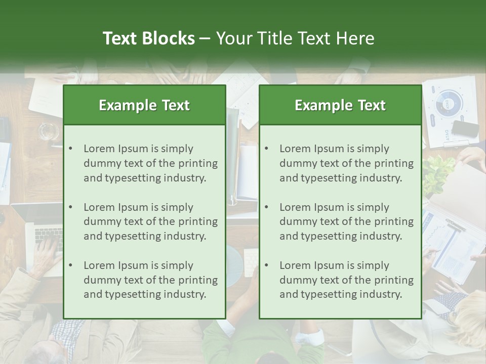 A Group Of People Sitting At A Table Working On Laptops PowerPoint Template