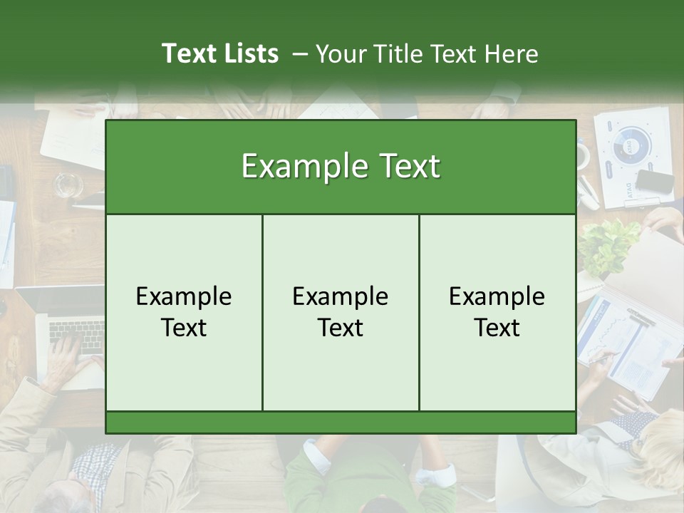 A Group Of People Sitting At A Table Working On Laptops PowerPoint Template
