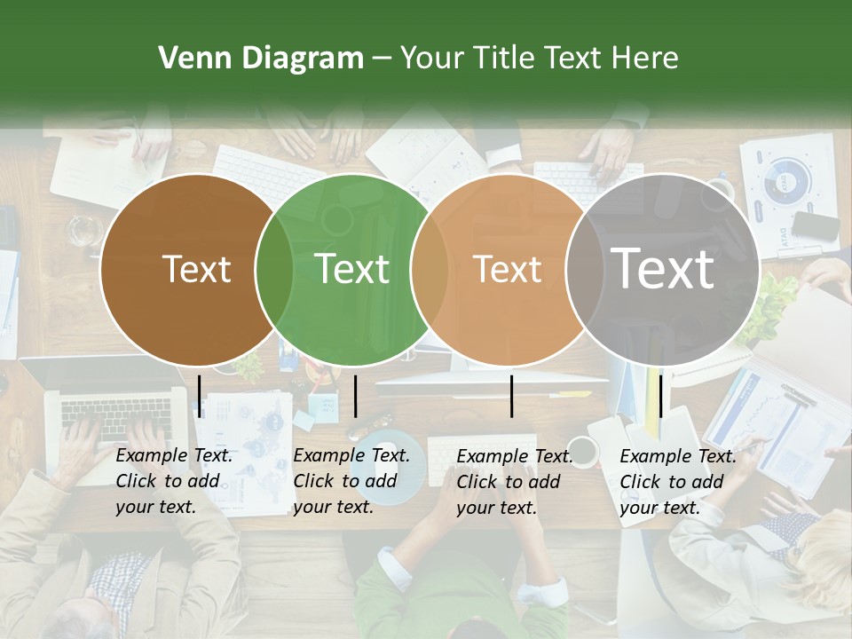 A Group Of People Sitting At A Table Working On Laptops PowerPoint Template