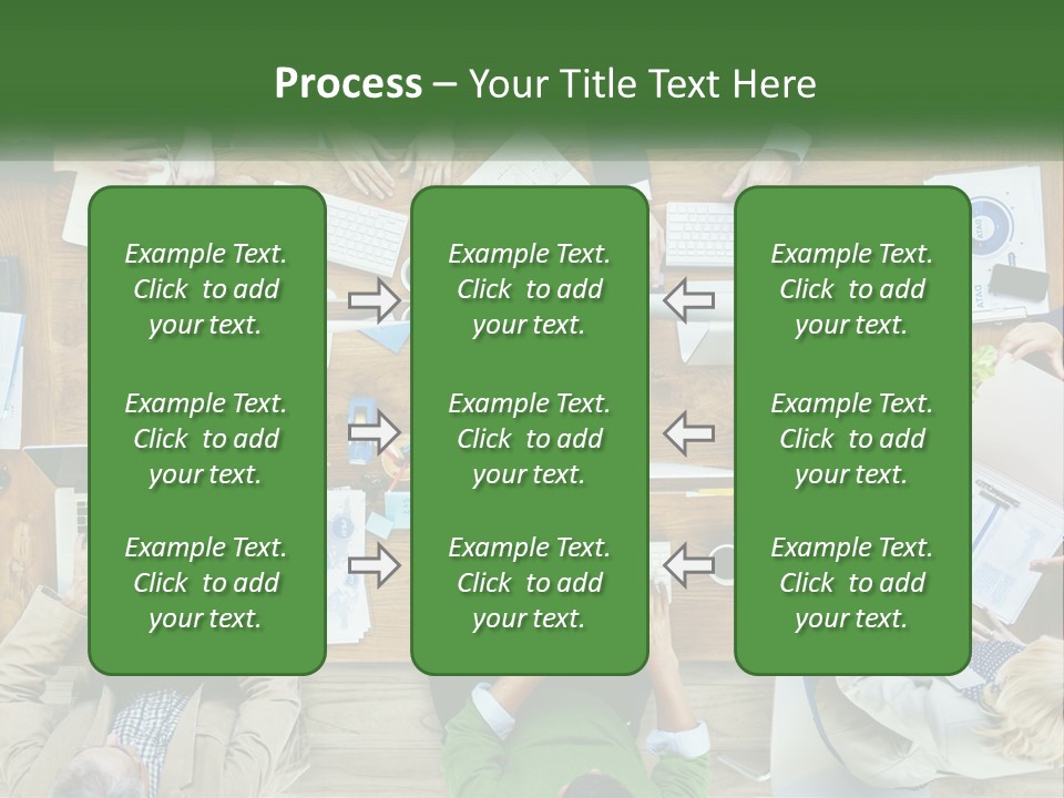A Group Of People Sitting At A Table Working On Laptops PowerPoint Template