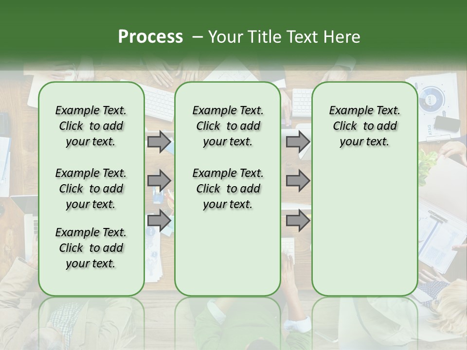 A Group Of People Sitting At A Table Working On Laptops PowerPoint Template