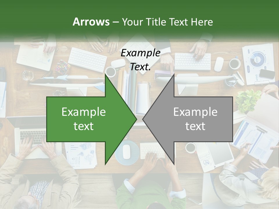 A Group Of People Sitting At A Table Working On Laptops PowerPoint Template
