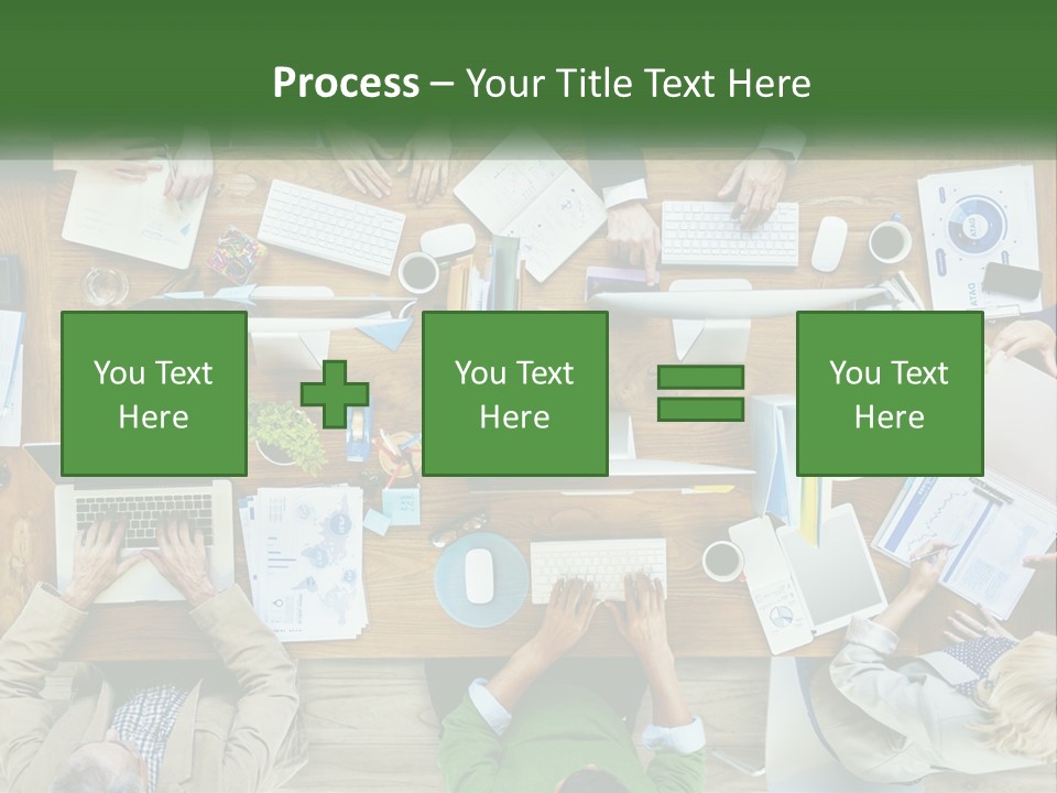 A Group Of People Sitting At A Table Working On Laptops PowerPoint Template