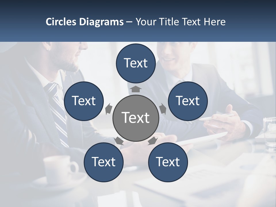 Two Men Sitting At A Table With A Tablet PowerPoint Template